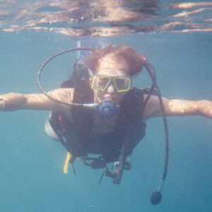 Gianni diving in the Caribbean sea, gaining international yacht specialist skills for future Costa Smeralda yacht services