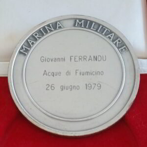 Detail of Gianni’s Medaglia di Benemerenza Marinara, awarded for lifesaving actions preceding YachtSitter's professional yacht services