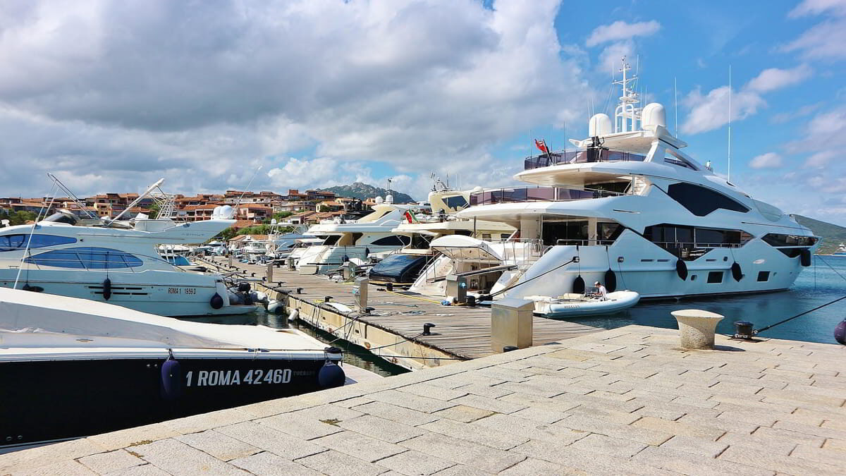 Luxury yachts docked at Marina di Porto Rotondo, a premier mooring destination in Northern Sardinia