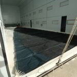 Large genoa sail laid out and cleaned