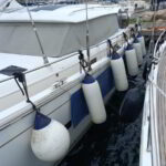 Yacht sitting: fenders adjusting