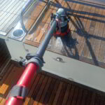 Marine-grade teak treatment being applied to yacht deck in Costa Smeralda